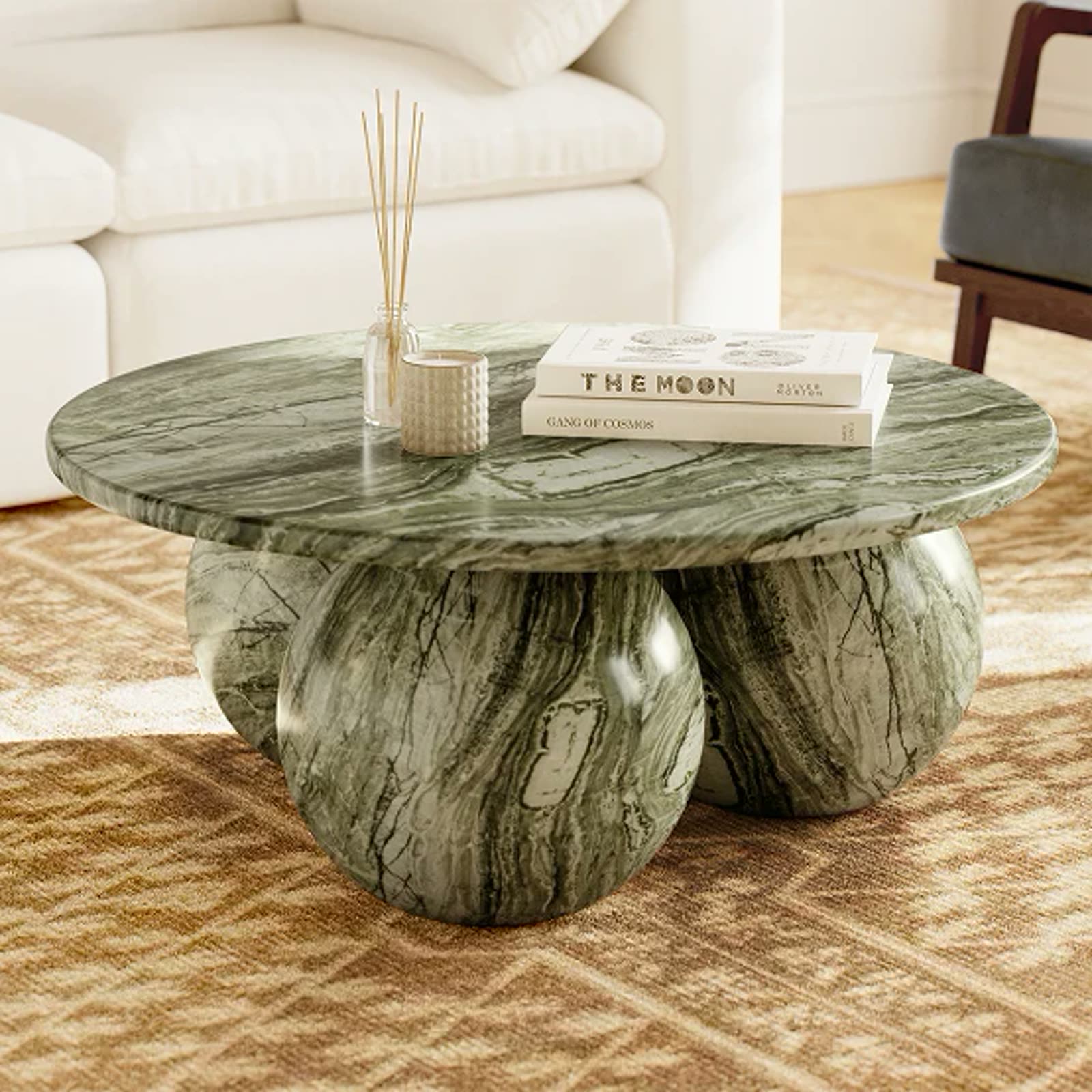 A green marble coffee table with every vein left in the stone